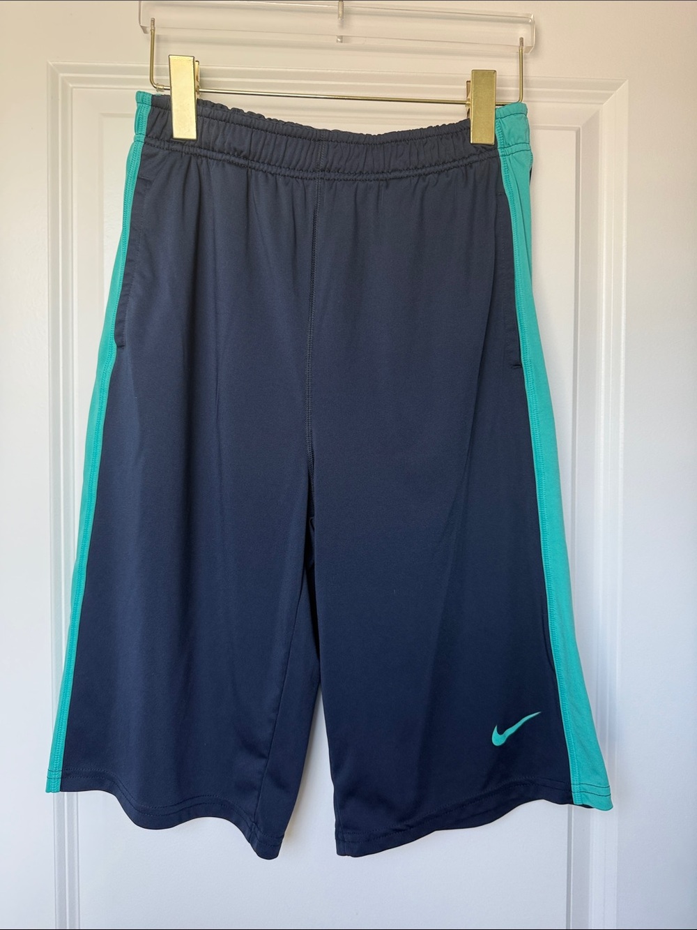 Nike Boys Navy Athletic Shorts with Teal Side Panels size XL